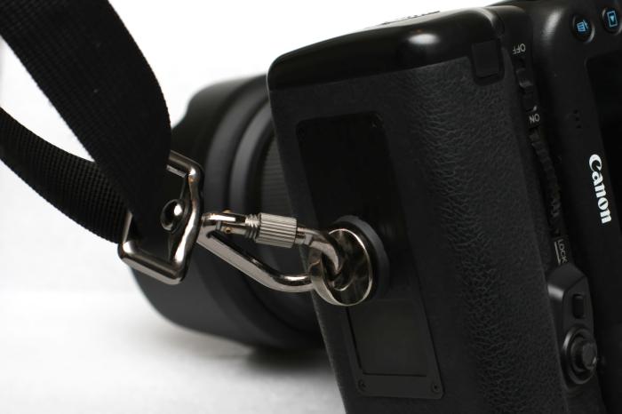 Ergonomisk kamerarem av rapidtyp